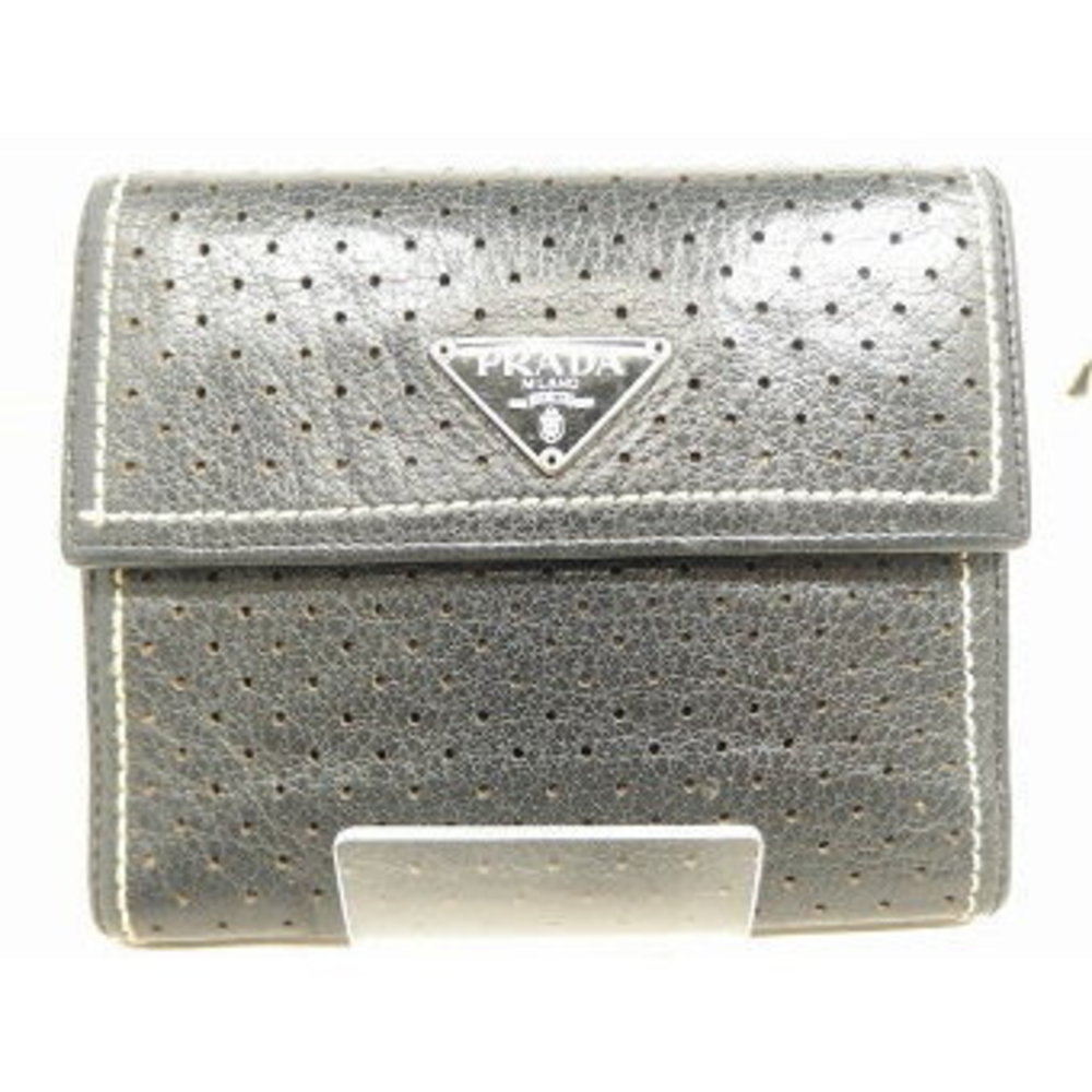 Prada Tri Wallet Punching